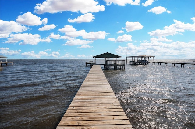 view of dock with a water view