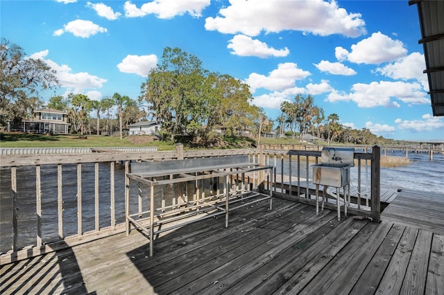 view of dock with a water view