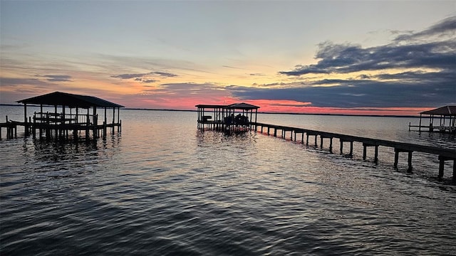 dock area featuring a water view and boat lift