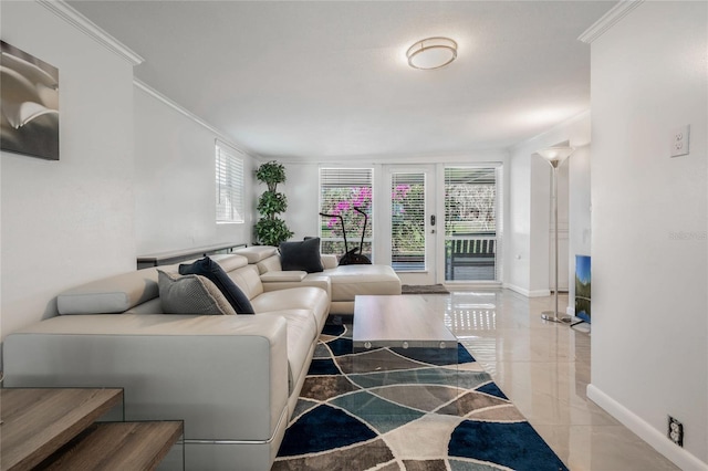 living room featuring ornamental molding and baseboards