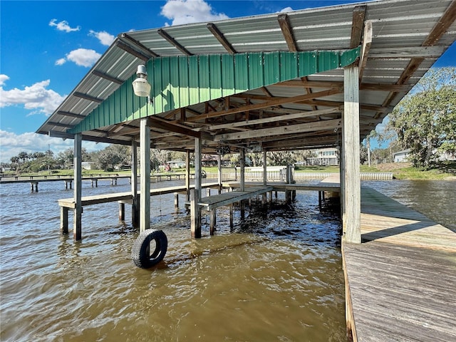view of dock with a water view