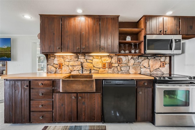 kitchen with tasteful backsplash, open shelves, a sink, dark brown cabinets, and appliances with stainless steel finishes