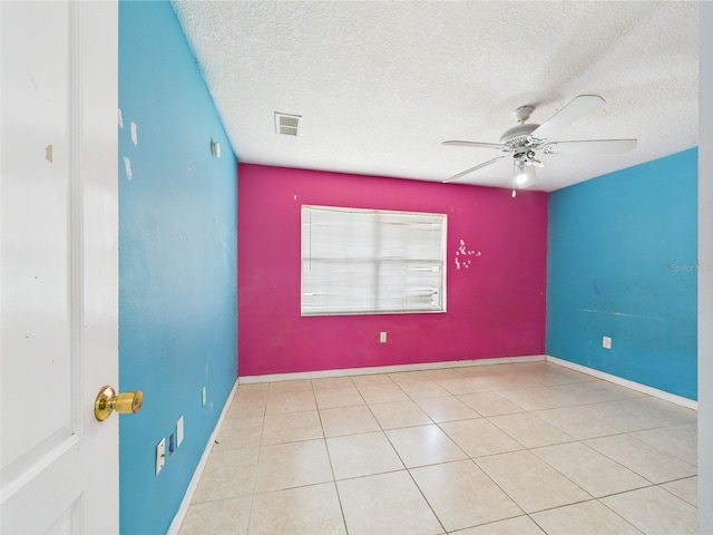91 W Cedarwood Cir, Kissimmee, FL 34743 - tiled spare room featuring ceiling fan and a textured ceiling