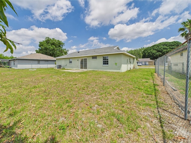 91 W Cedarwood Cir, Kissimmee, FL 34743 - back of house with a patio area and cooling unit