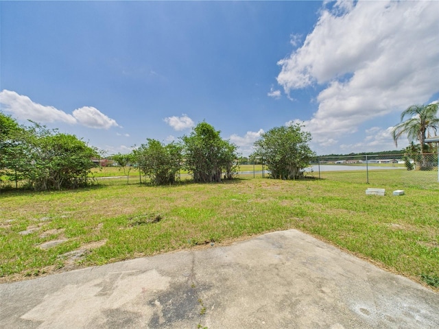 91 W Cedarwood Cir, Kissimmee, FL 34743 - view of yard featuring a water view
