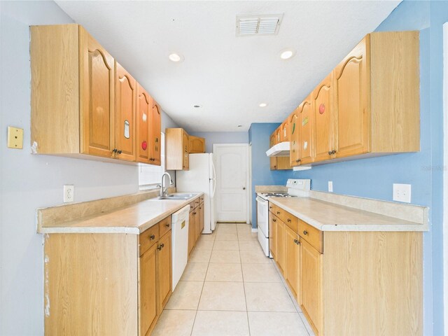 91 W Cedarwood Cir, Kissimmee, FL 34743 - kitchen with white appliances, a sink, under cabinet range hood, light countertops, and recessed lighting