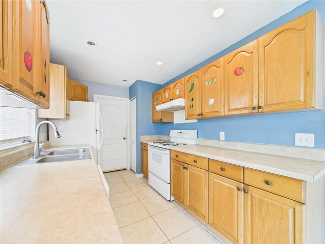 91 W Cedarwood Cir, Kissimmee, FL 34743 - kitchen with electric range, under cabinet range hood, a sink, light countertops, and recessed lighting
