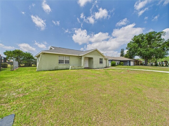 91 W Cedarwood Cir, Kissimmee, FL 34743 - view of front of property featuring stucco siding
