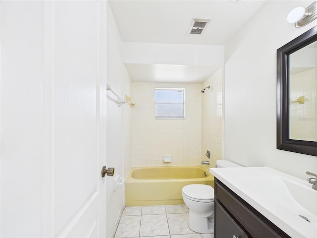 2434 Mill Run Blvd, Kissimmee, FL 34744 - bathroom featuring toilet, washtub / shower combination, visible vents, marble finish floor, and vanity