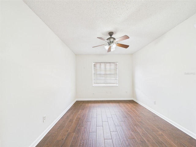 2434 Mill Run Blvd, Kissimmee, FL 34744 - empty room featuring baseboards, dark wood finished floors, ceiling fan, and a textured ceiling