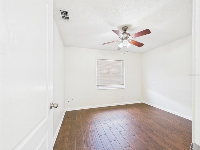 2434 Mill Run Blvd, Kissimmee, FL 34744 - empty room featuring a textured ceiling, visible vents, baseboards, ceiling fan, and dark wood-style floors