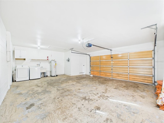 2434 Mill Run Blvd, Kissimmee, FL 34744 - garage featuring washing machine and clothes dryer, water heater, a garage door opener, and a sink