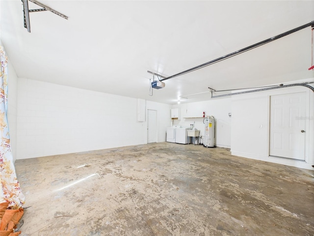 2434 Mill Run Blvd, Kissimmee, FL 34744 - garage with a sink, separate washer and dryer, a garage door opener, and water heater
