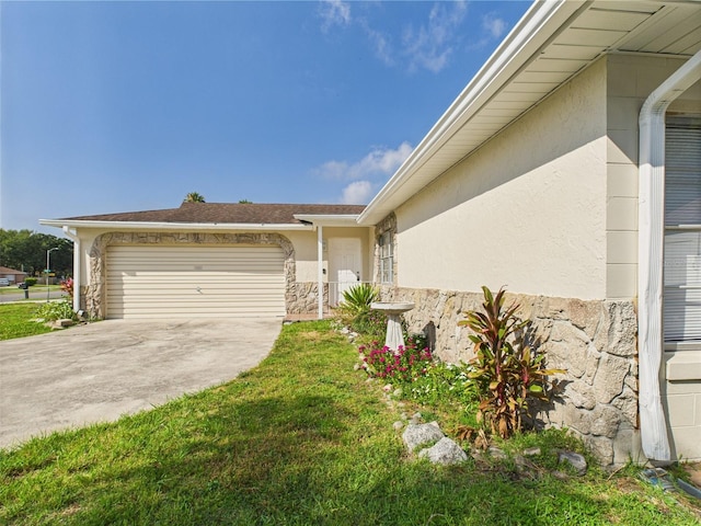 2434 Mill Run Blvd, Kissimmee, FL 34744 - exterior space with stone siding, concrete driveway, stucco siding, and an attached garage
