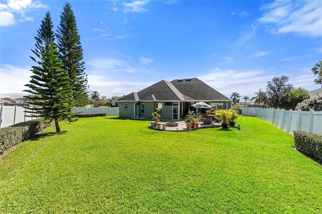 view of yard featuring a fenced backyard and a patio