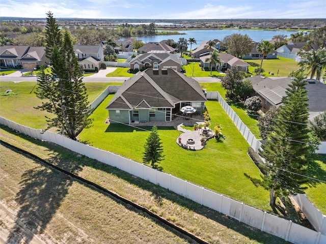 bird's eye view featuring a residential view and a water view