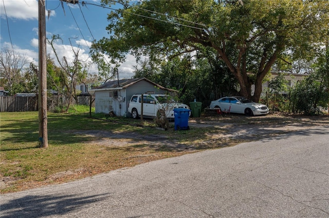 view of side of property with fence