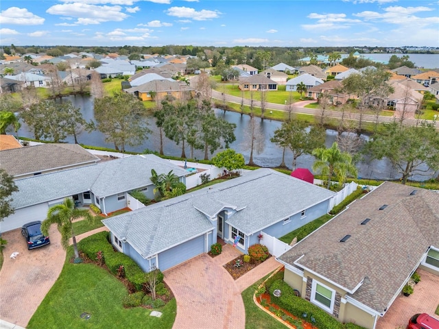 aerial view featuring a water view and a residential view