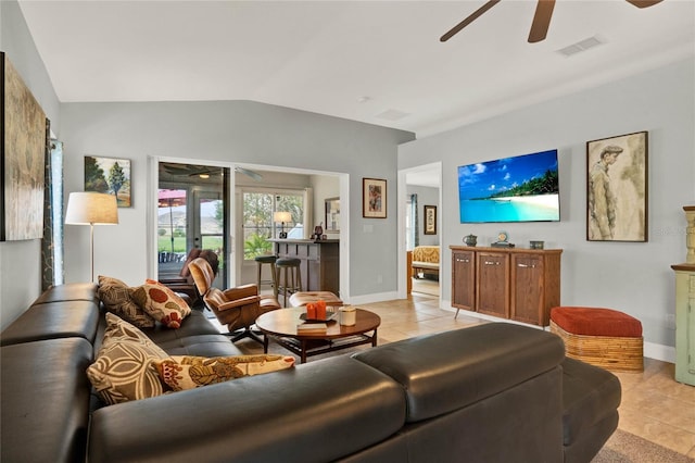 living room with vaulted ceiling, ceiling fan, light tile patterned floors, and visible vents