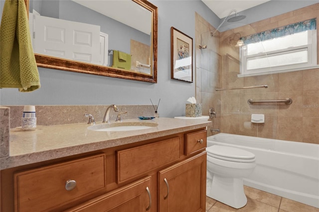 full bath featuring  shower combination, vanity, toilet, and tile patterned floors