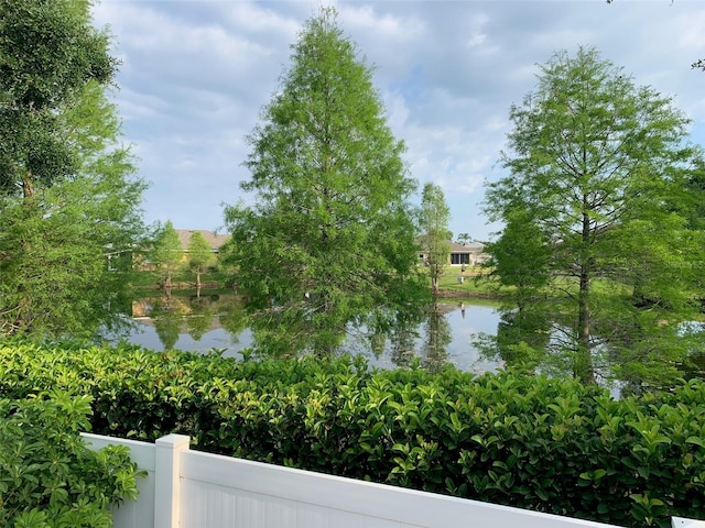 water view featuring fence