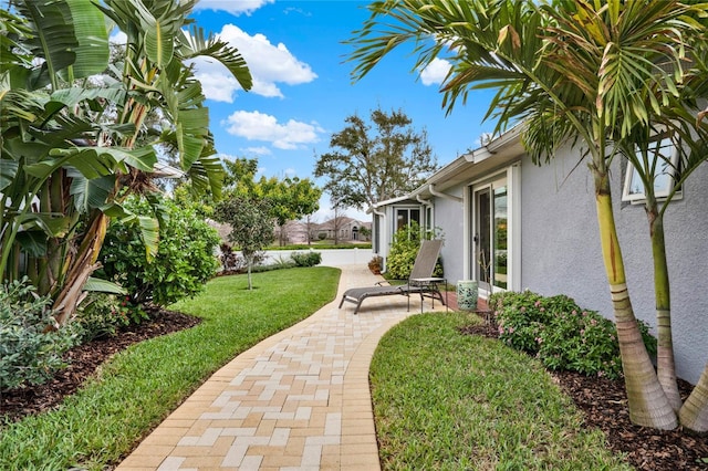 view of yard featuring a patio area and fence