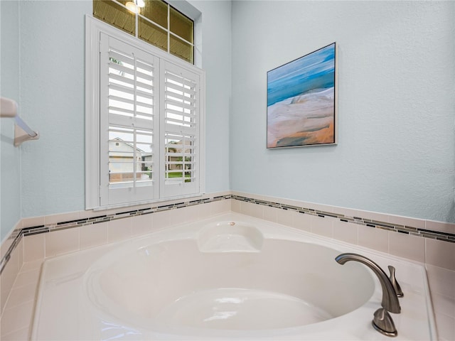 bathroom featuring a bath