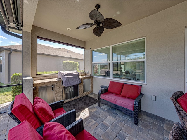 view of patio / terrace with outdoor lounge area, ceiling fan, and area for grilling