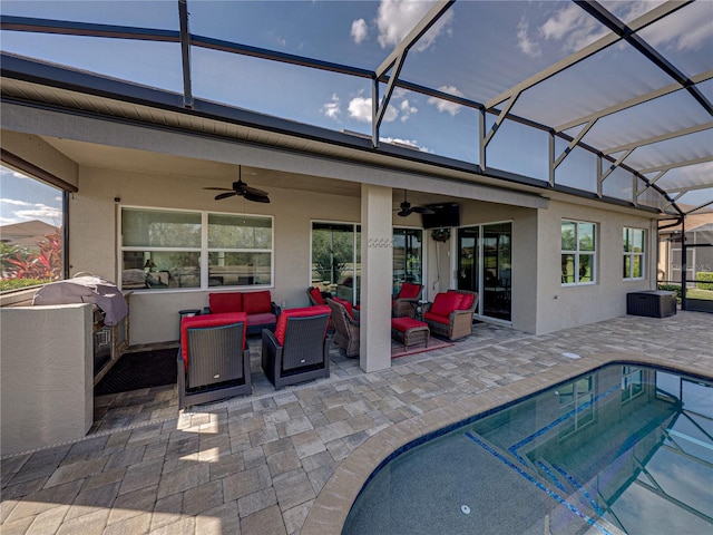 pool featuring a patio area, a lanai, and an outdoor living space