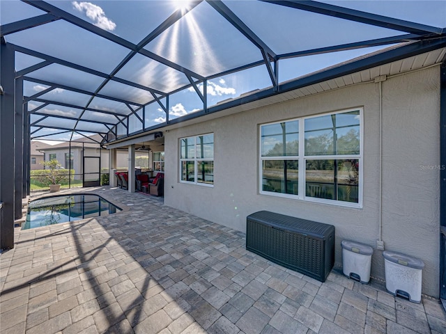 outdoor pool featuring a patio and a lanai