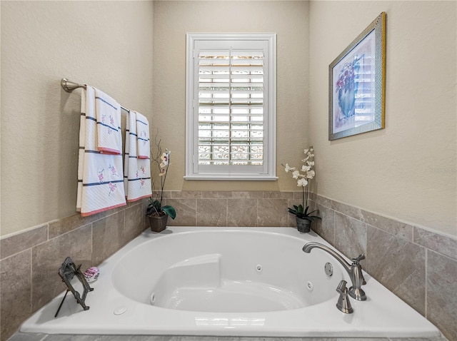 bathroom featuring a whirlpool tub