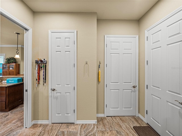 foyer entrance with baseboards