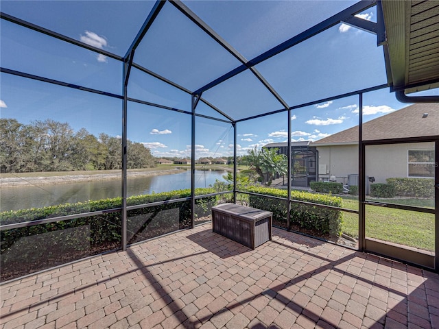 sunroom with a water view