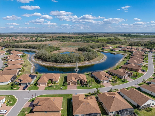 aerial view featuring a water view and a residential view