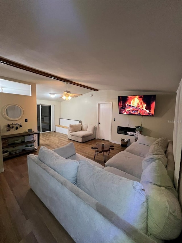 living room featuring wood finished floors and a ceiling fan