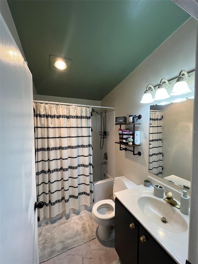 bathroom with shower / tub combo, vaulted ceiling, vanity, and toilet