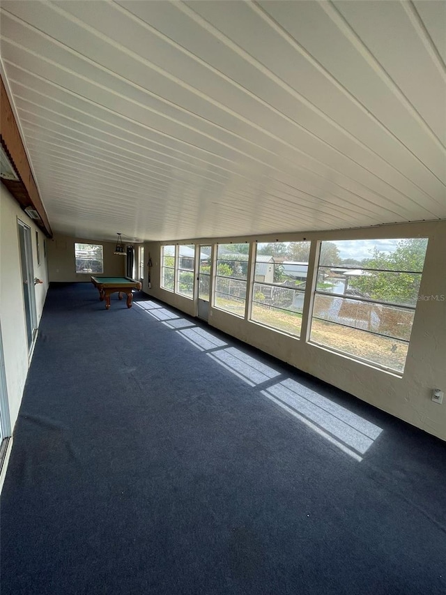 unfurnished sunroom featuring pool table