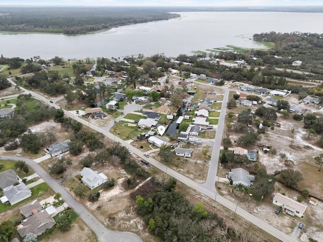 aerial view featuring a residential view and a water view