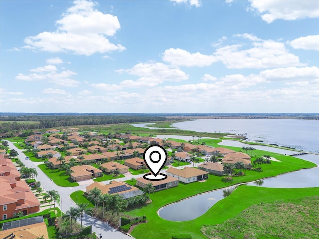 aerial view with a water view and a residential view