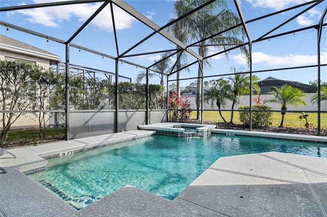 view of swimming pool featuring a lanai, a pool with connected hot tub, and a patio