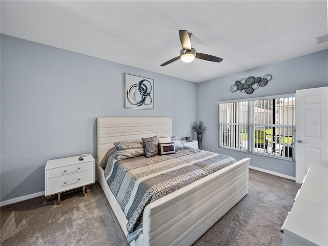 bedroom featuring carpet, baseboards, and ceiling fan