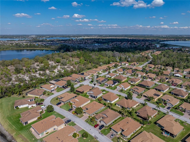 aerial view featuring a water view and a residential view