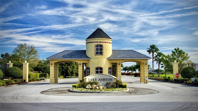 exterior space featuring curved driveway