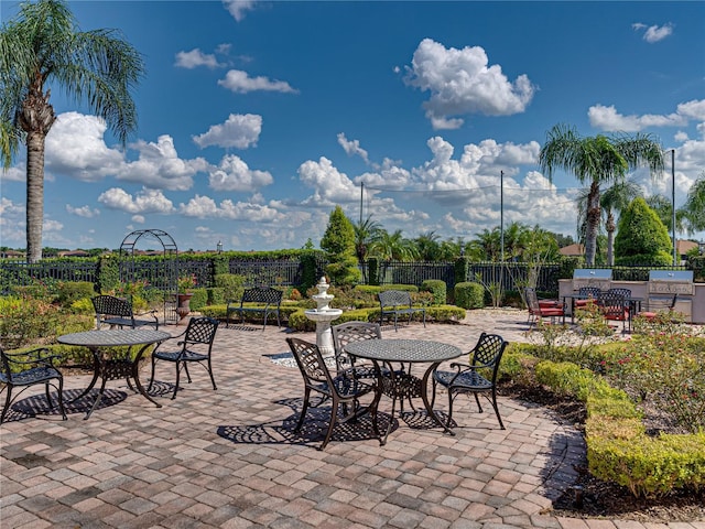 view of patio / terrace featuring fence