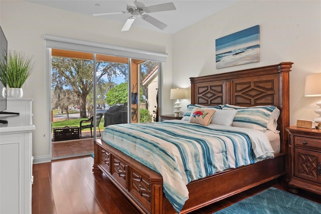 bedroom with dark wood-style floors, access to outside, and ceiling fan