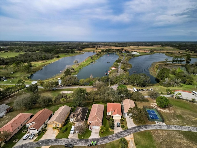 aerial view with a water view and a residential view