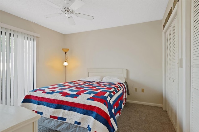 bedroom featuring carpet floors, baseboards, and a ceiling fan