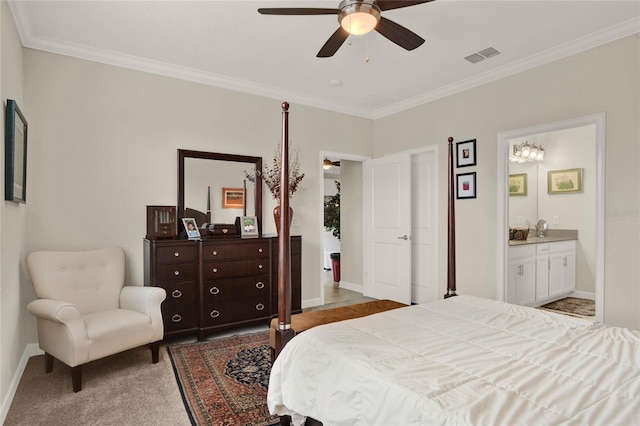 bedroom with light colored carpet, visible vents, ornamental molding, connected bathroom, and baseboards