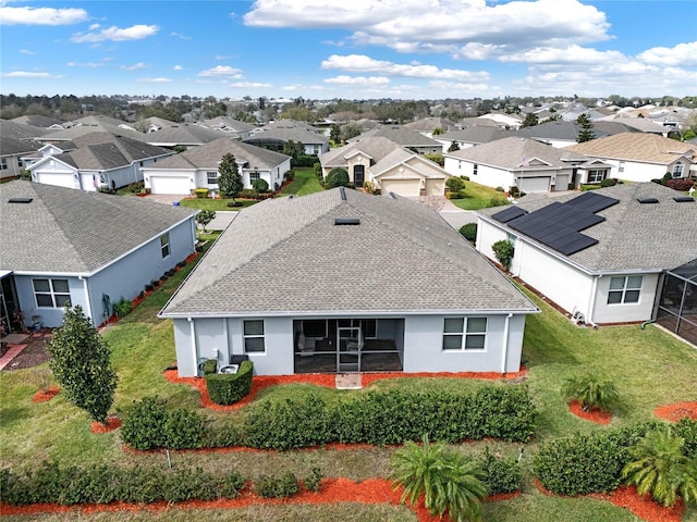 drone / aerial view with a residential view