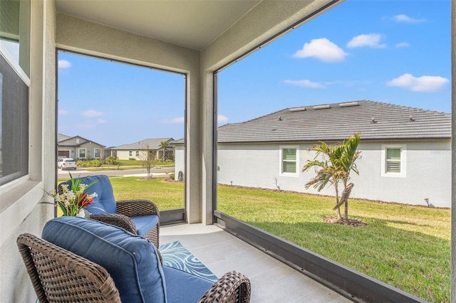 sunroom with a residential view